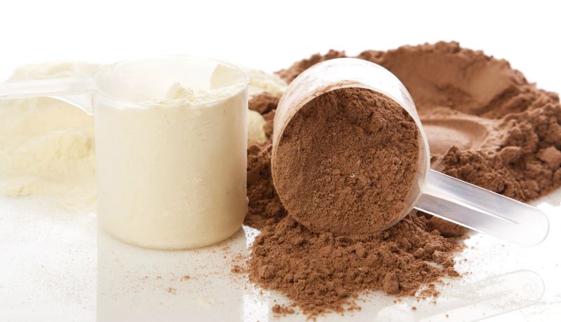 Close up of protein powder and scoops