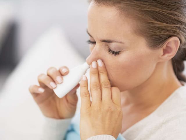 woman putting flo sinus care