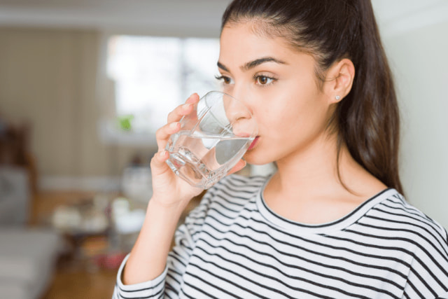 girl drinking water