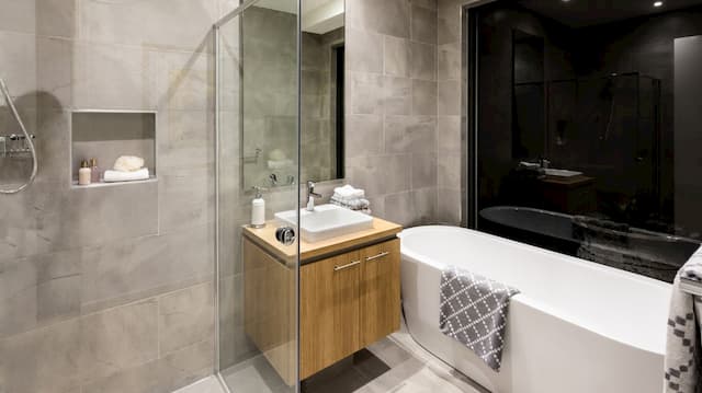 freestand bathroom vanity with sink and bath