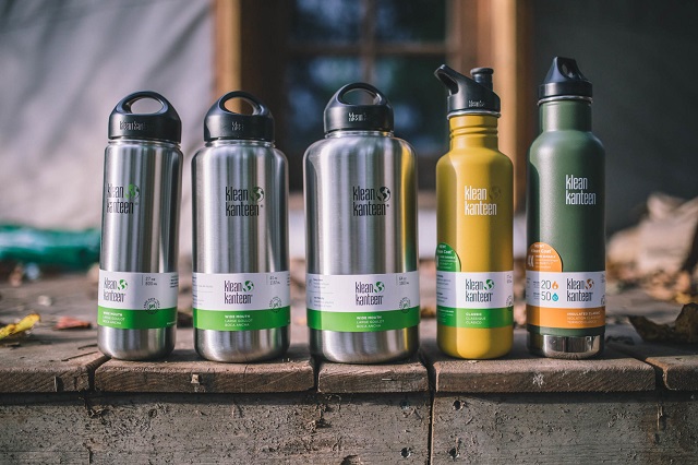 picture of a lot types of klean kanteen canisters on the porch 