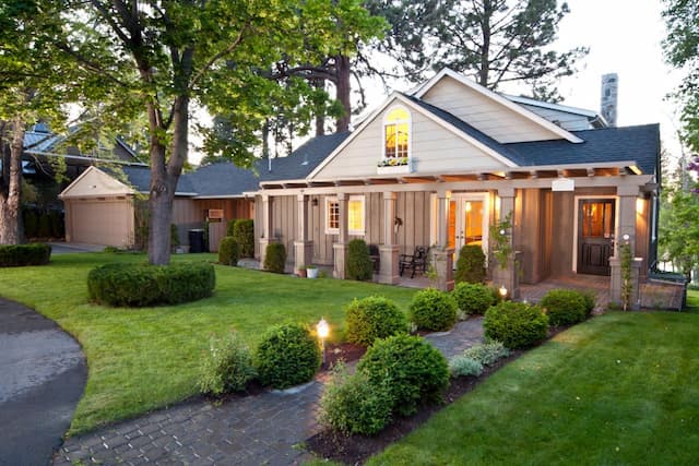 house with garden with flowers and trees