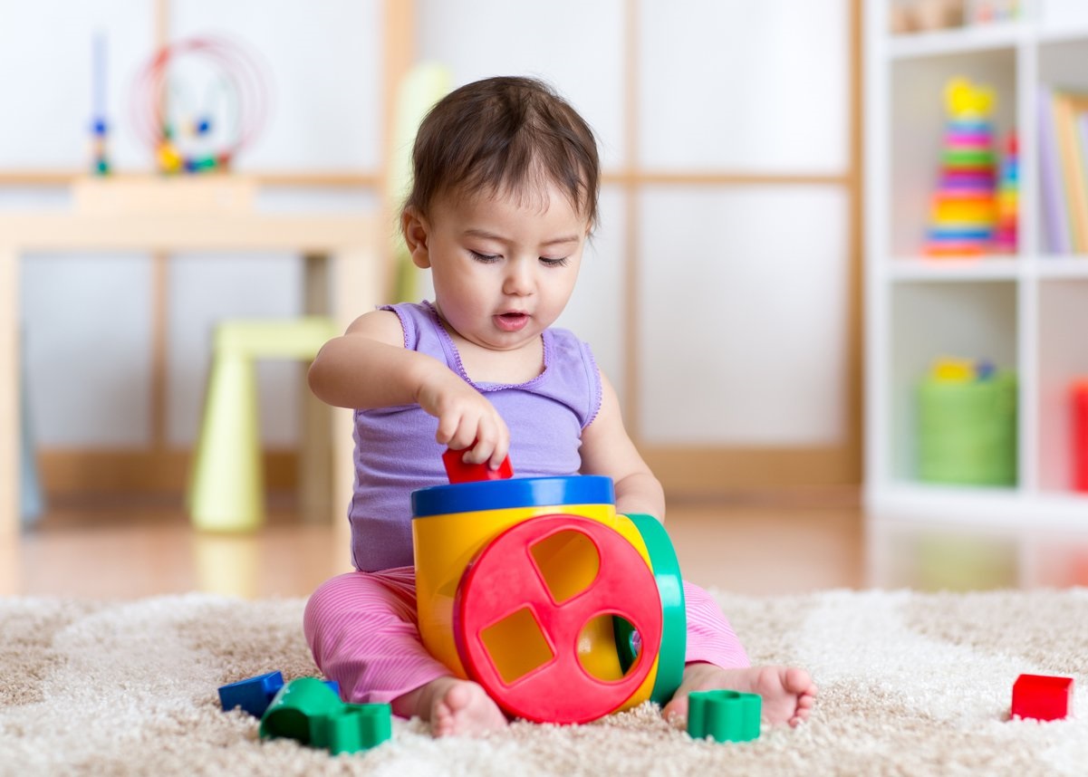 baby playing with baby toys