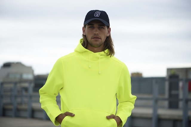 boy wearing yellow workwear hoodie