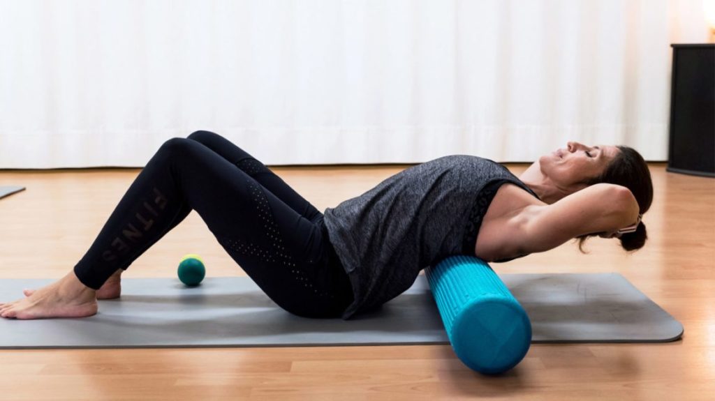 female on a foam roller