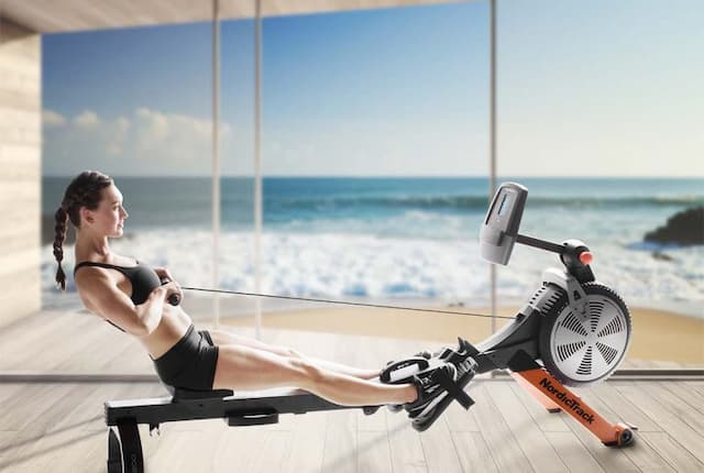 exercising on rowing machine