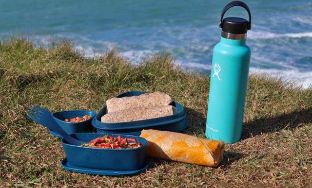 Packed lunch and water by the sea