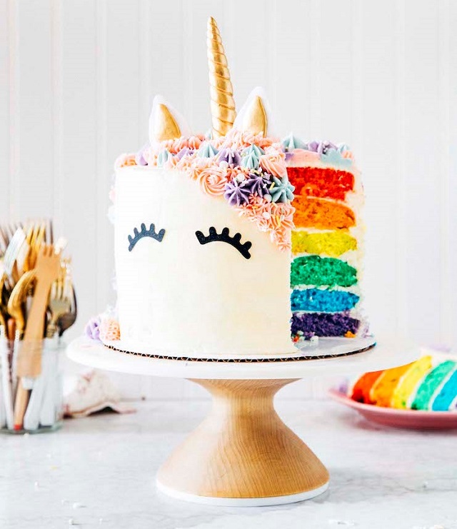 unicorn rainbow cake on platter 