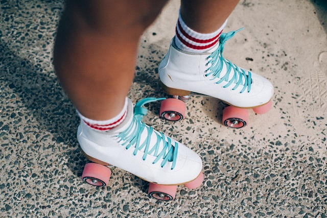 picture of person driving roller skates with socks 
