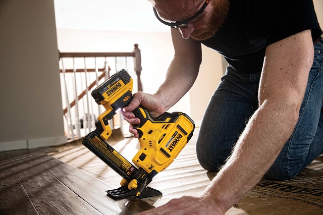 Close-up of working with DeWalt Stapler