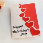 Valentine's Day card with roses beside