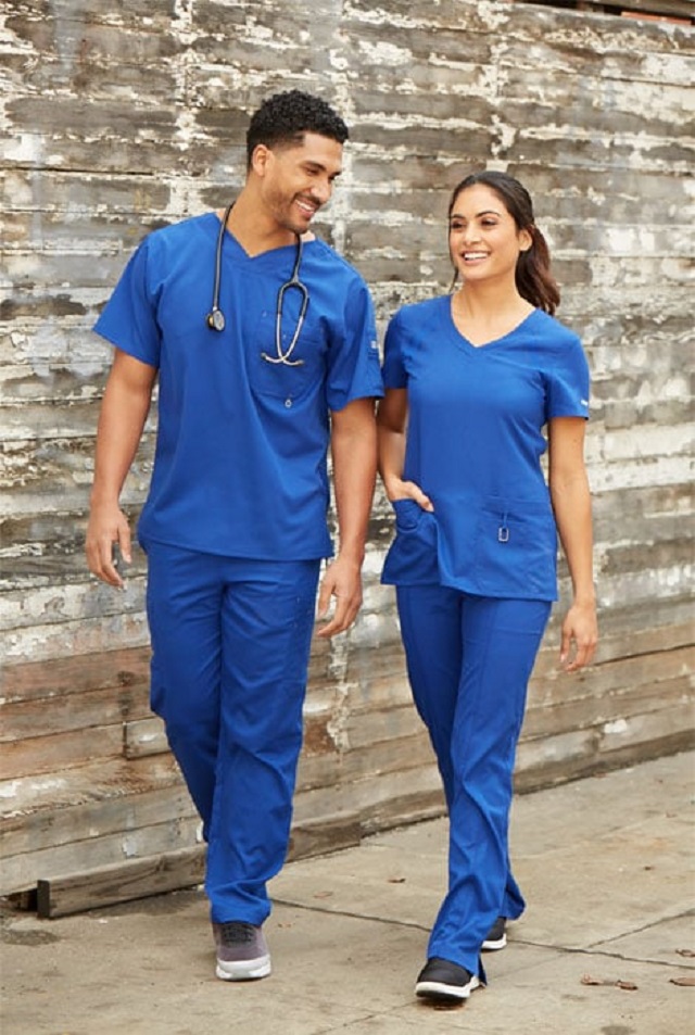 Male and female in scrubs