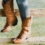 woman wearing Ariat boots