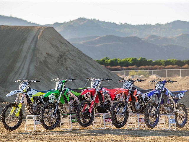 Dirt bikes on stands in nature