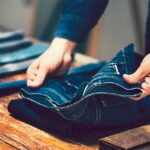 man choosing Thomas Cook jeans