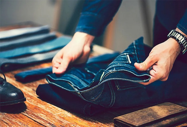 man choosing Thomas Cook jeans