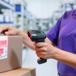 woman using barcode reader