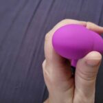 person holding suction dildo